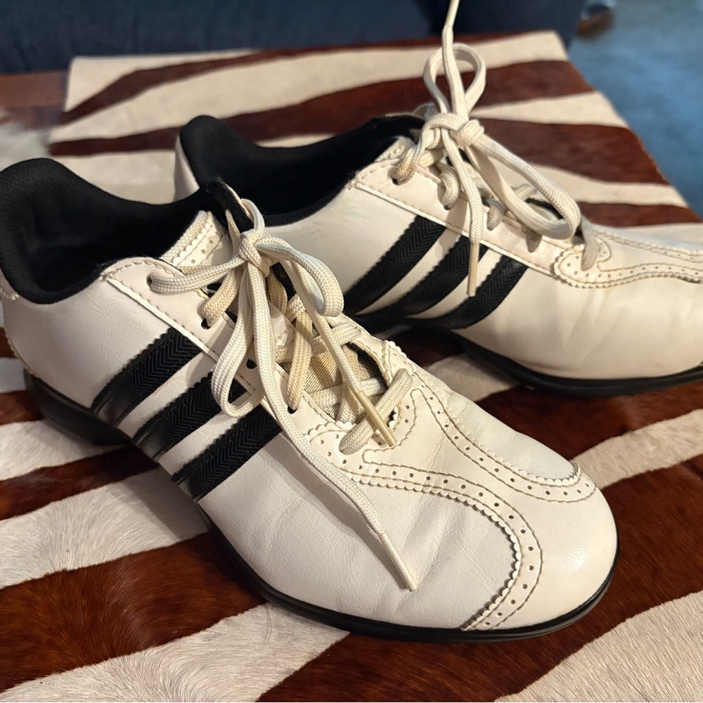 Adidas Men's White Athletic Shoes with Black Stripes